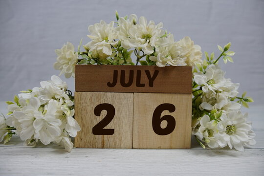 Wooden Calendar Showing the Date of July 26th. Day 26 of July month