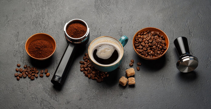 Espresso preparation tools and coffee beans flat lay composition