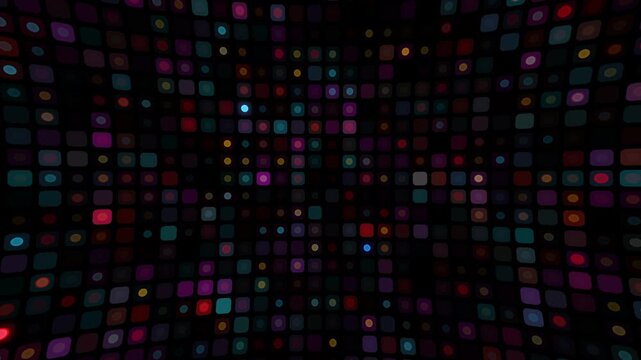 Abstract dynamic grid of colorful twinkling lights and glowing rounded squares on a dark background featuring a vibrant digital pattern for modern motion graphics design