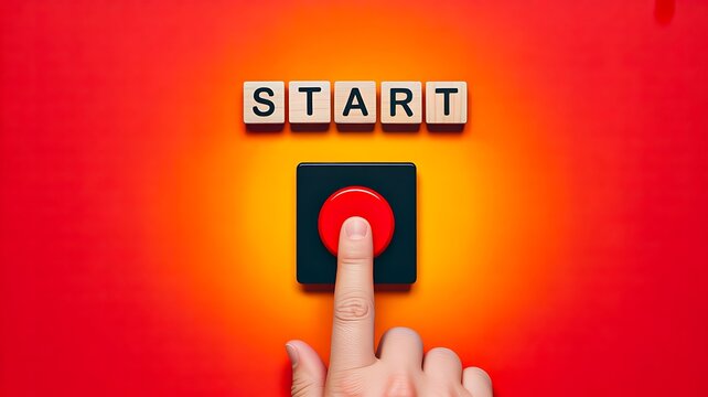 Finger pressing start button for business startup and launch concept