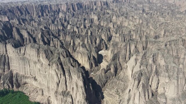 Aerial view of the magnificent canyons and oases at Yellow River Stone Forest Scenic Area, Baiyin, Gansu
