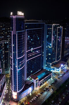 Aerial view of illuminated high-rise buildings at night. Batumi cityscape with skyscrapers illuminated at night: Georgia, Batumi - May 19, 2026.