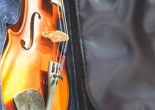 A violin in its case close-up