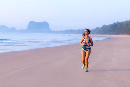 Women in swimsuit exercise