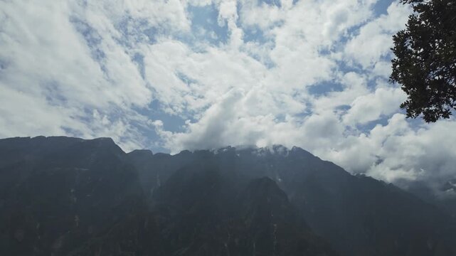 Pan Reveal Mountain Landscape with Sun Rays and Clouds Tiger Leaping Gorge High Trail Yunnan China