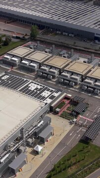 Aerial view of a modern hyperscale data center campus in northern Italy with advanced cloud infrastructure, enterprise computing facilities and AI technology operations.