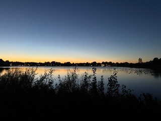 Obraz premium sunset over the river