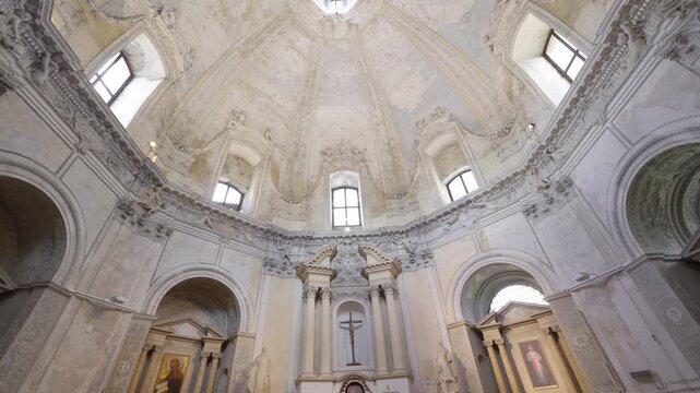 Vilnius, Lithuania &ndash; May 27, 2026: Sliding shot inside The Church of Jesus the Redeemer showcasing the ornate ceiling and Baroque dome