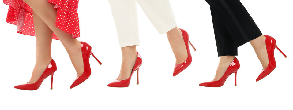 Women walk in stylish red high heel shoes on display, isolated, PNG