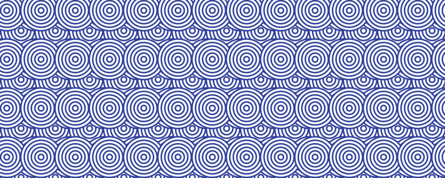 Seamless Japanese wave pattern in blue and white, inspired by traditional Seigaiha design, perfect for textiles, backgrounds, and decorative projects