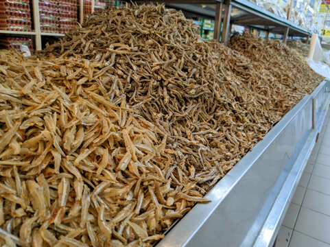 Traditional dried anchovies ikan teri at an Asian traditional market shelf
