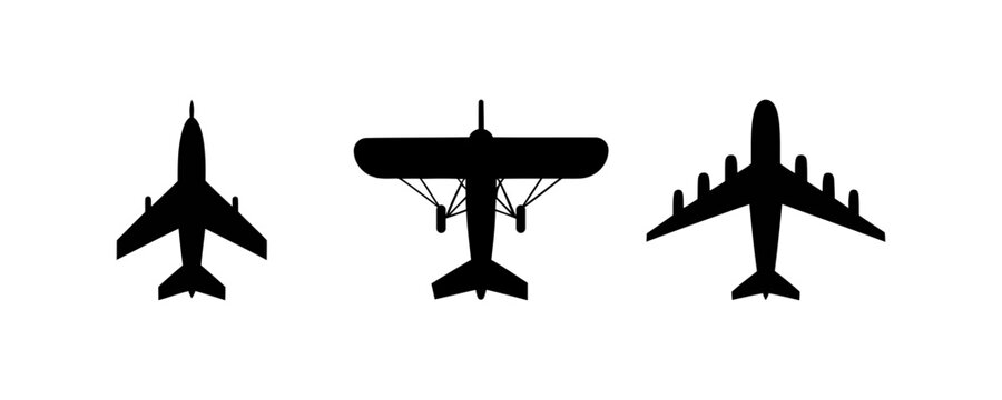 Three black silhouettes of different airplanes