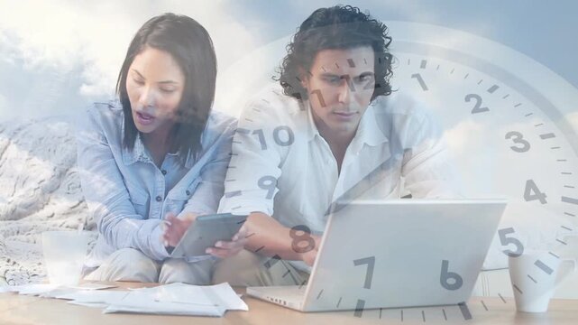 Couple sorting bills, woman tapping tablet, leading man typing, clock overlay urging finance