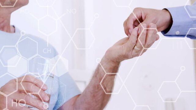Caregiver handing pills into patient hand, patient holding water, hexagon overlay for dosing
