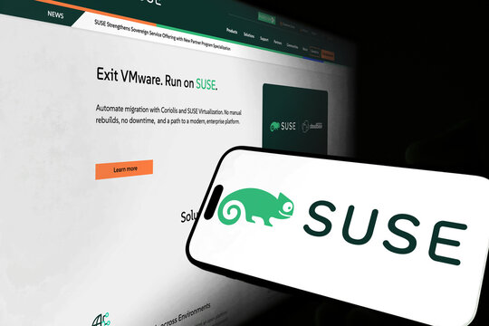 Kiel, Germany - 05-20-2026: Smartphone displaying the German enterprise software company SUSE app in the App Store in a workspace environment with laptop and notebook