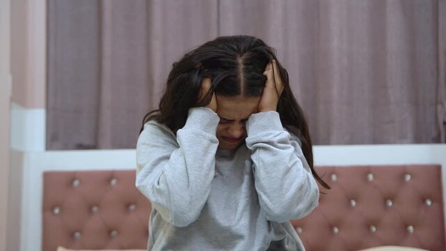 Indian Woman Feeling Depressed and Stressed Sitting Alone at Home