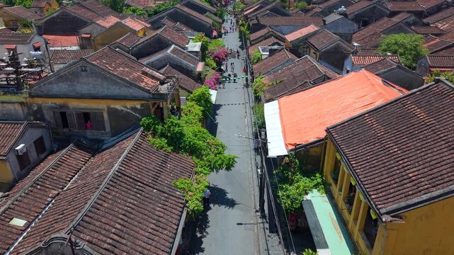 Aerial drone view of Hoi An city, Quang Nam province, Vietnam. Panoramic footage of Ancient town, UNESCO world heritage. One of the most travel popular touristic destinations