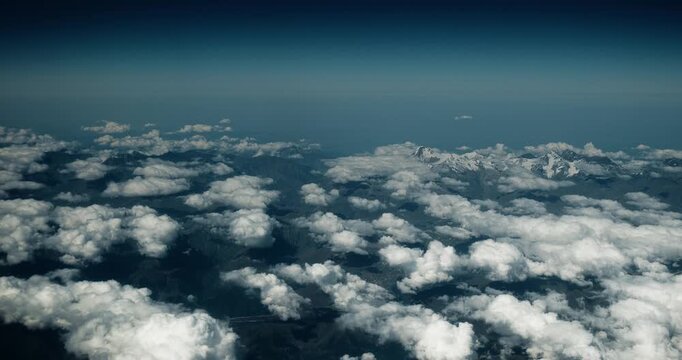 View From Airplane Window On Snow-capped Peaks Of Mount Elbrus And Main Caucasian Range.