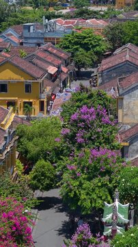 Aerial drone view of Hoi An city, Quang Nam province, Vietnam. Panoramic footage of Ancient town, UNESCO world heritage. One of the most travel popular touristic destinations