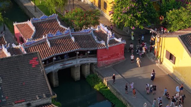 Aerial view of Chua Cau or Japanese Covered ancient Bridge and River in Old city of Hoi An, Vietnam. One of the most travel popular touristic destinations, UNESCO world heritage