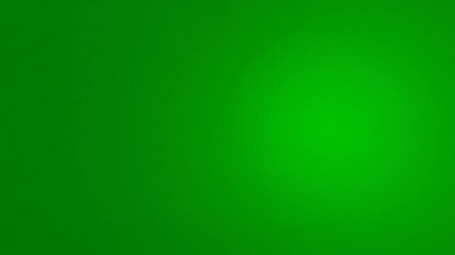 A smooth and vibrant solid green background surface texture
