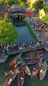 Aerial view of Chua Cau or Japanese Covered ancient Bridge and River in Old city of Hoi An, Vietnam. One of the most travel popular touristic destinations, UNESCO world heritage 