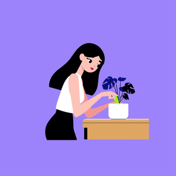 Woman Checking Smart Plant Pot Sensor with Green LED Indicator