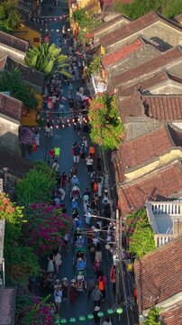 Aerial drone view of Hoi An city, Quang Nam province, Vietnam. Panoramic footage of Ancient town, UNESCO world heritage. One of the most travel popular touristic destinations