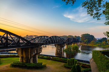 Fototapeta premium Landscape of Bridge River Kwai at Kanchanaburi, Thailand in morning time. Is a famous place and a tourist destination
