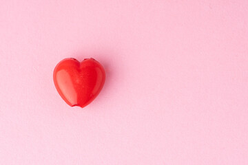 Fototapeta premium red heart on a pink background