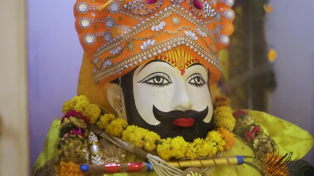 close up portrait of hindu lord khatu shyam ji idol with decorative crown