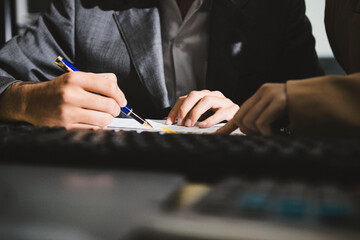 Fototapeta premium Accounting company provide finance and taxation planning for profitable cash flow, Auditor accountant working in office, analyze financial data and accounting record with calculator