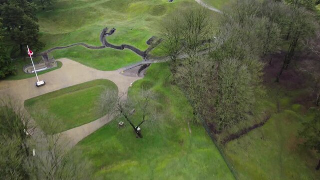 World War I trenches. Aerial view. Vimy National Monument, Canada. Trenches and battlefield with the Canadian flag. Vimy Ridge. France.