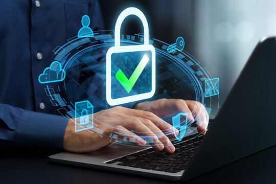 Information security and data protection. Cybersecurity and access control. Businessman using laptop computer with secure communication tools.
