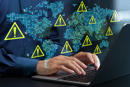 Geopolitical risk analysis. Risk management for global business. World map and warning triangle icons. Businessman evaluating regional tensions on laptop computer.