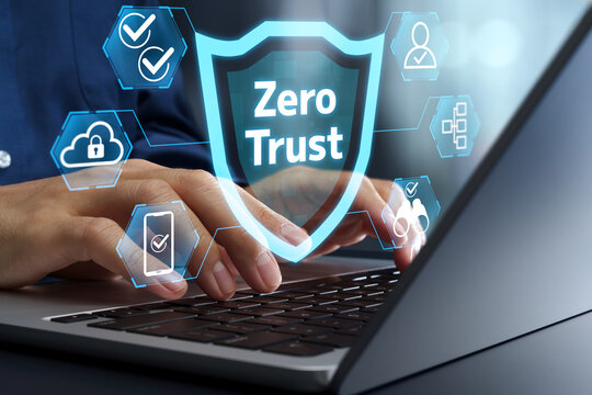 Zero trust security and access control. Identity verification and multi-factor authentication. Businessman using secure network system on laptop computer.