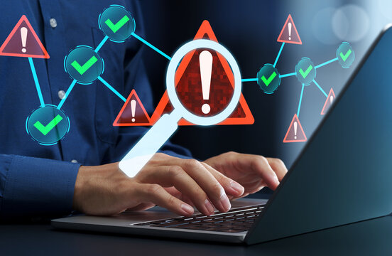 Network security monitoring system. Threat and intrusion detection. Operations monitoring and alert management. Businessman using laptop computer with anomaly detection system.