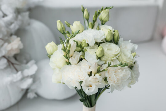 Exquisite bridal flower bouquet with eustoma carnation and freesia for wedding day.
