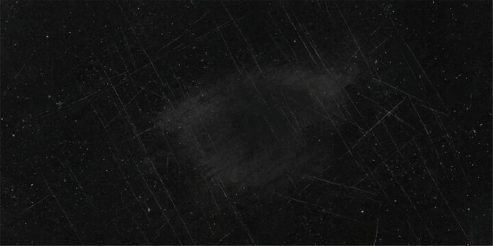 A dark, scratched surface suggests a story of time and wear, inviting imagination and intrigue.