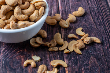 Fototapeta premium Salted Cashew Nuts In Bowl