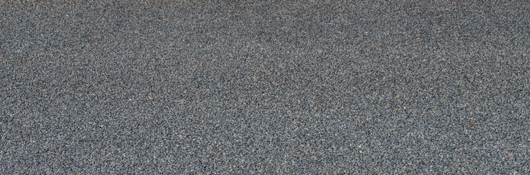Fine dark grey asphalt road surface texture background for transport infrastructure and construction design