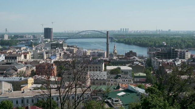Breathtaking views of the Dnieper embankment highlight lively activities and nature. Podil, Kyiv, Ukraine, May 21, 2026