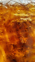 A refreshing macro texture details macro shot drink ice on glass and water dropes.jpg with condensation © sutthichai