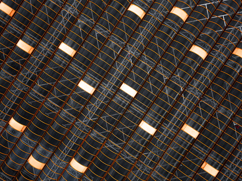 Aerial view of the industrial roof structure featuring repetitive glass panels and metal frames in Warszawa, Masovian Voivodeship, Poland.