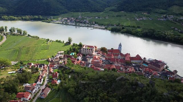 Durnstein Aerial View Wachau Valley Danube River Blue Church Vineyards Panorama Lower Austria Medieval Village Riverfront Cruise Ship Pier Landscape Hills Opposite Bank Tourism UNESCO Destination
