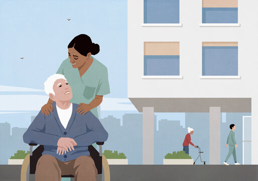 Friendly female nurse with senior man in wheelchair outside hospital