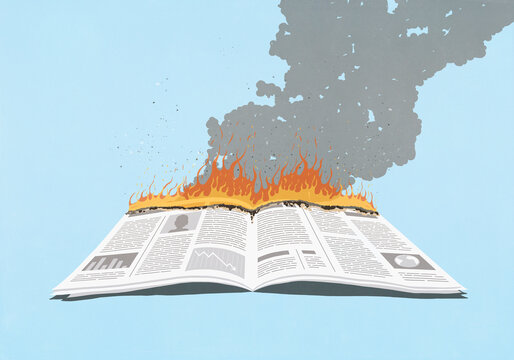 Newspaper burning with smoke plume against blue background