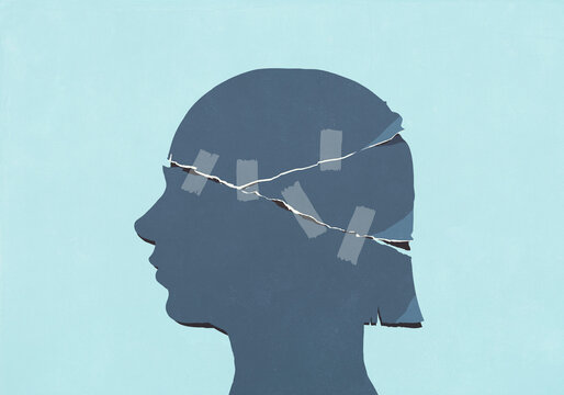 Torn head of girl's profile mended with adhesive tape