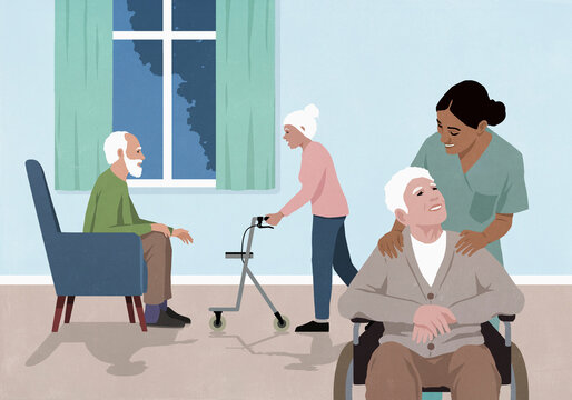 Friendly female nurse with senior man in wheelchair in assisted care facility