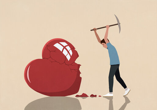 Angry young man with axe smashing large heart against beige background